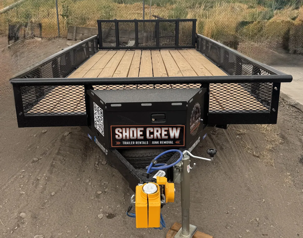 Shoe Crew 7x14 utility trailer with mesh sides and wood deck