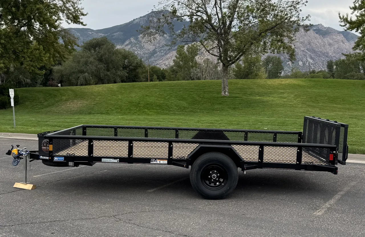 7x14 utility trailer side view with metal mesh sides
